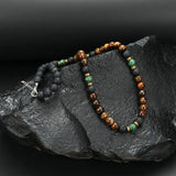 Náhrdelník zapinanim tygriho oka zlatym koralky